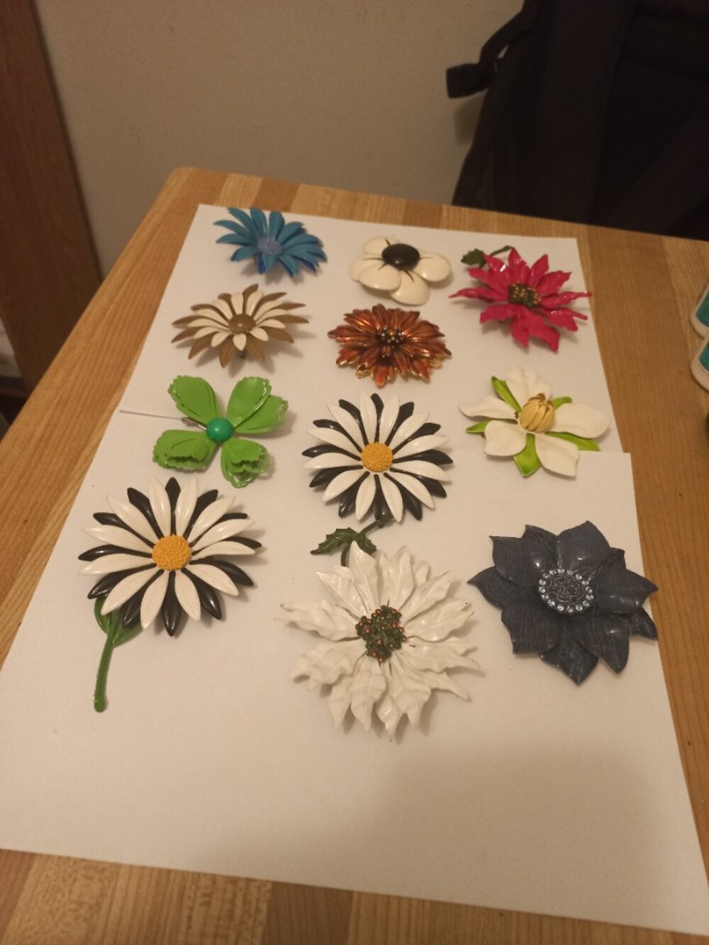 Vintage 11 enamel flower Brooches (including 1 bronze joan rivers)ding